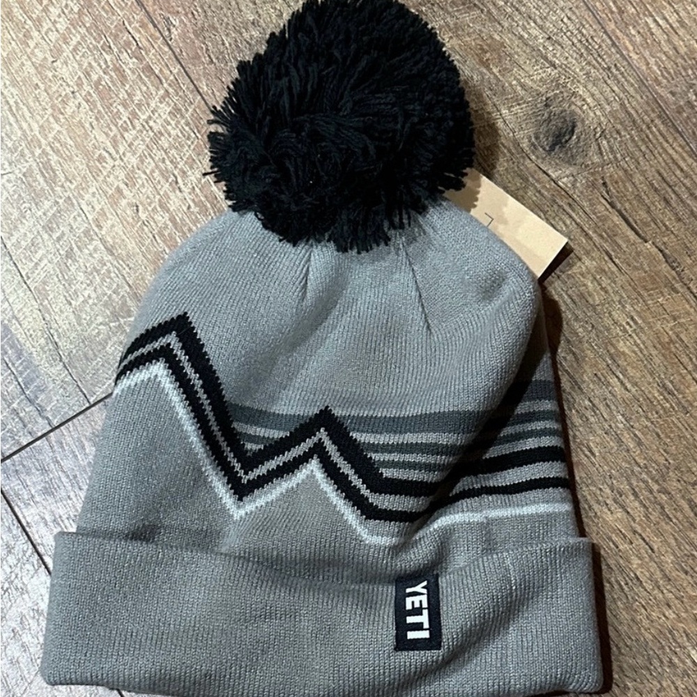 Yeti Gray and Black Pom Beanie